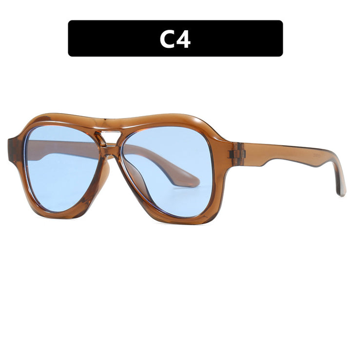 Dame moterik solbrille i innovativ design med bred ramme Skanto