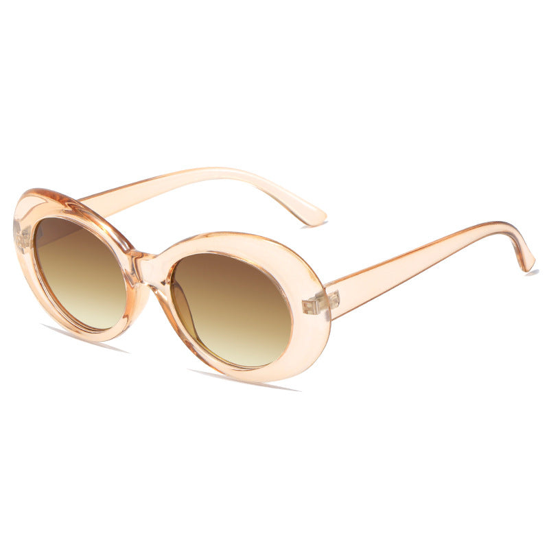 Dame retro-inspirerte solbriller med en elegant, oval ramme Skanto