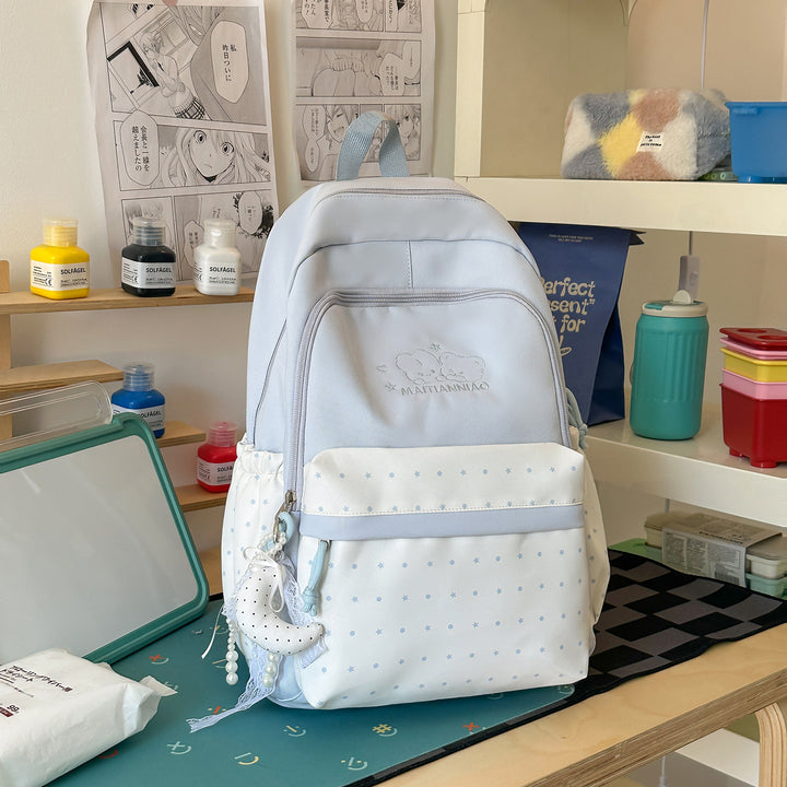 Sjarmerende flerlomma skole ryggsekk