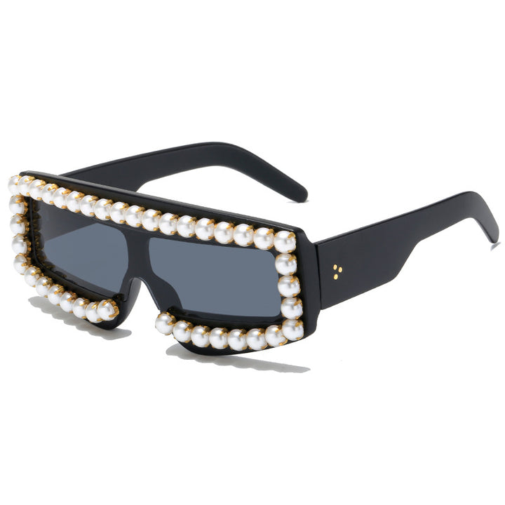 Dame moteriktig solbrille med perle-applikasjoner Skanto