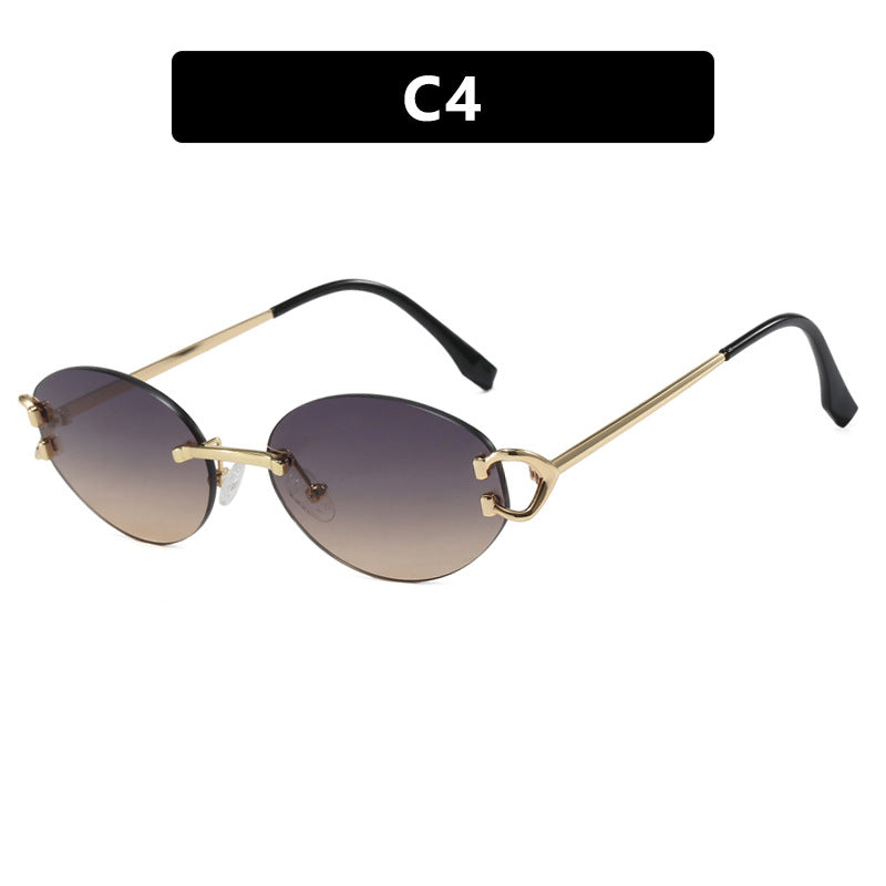 Dame elegant ovalformet solbrille med moderne metalramme Skanto
