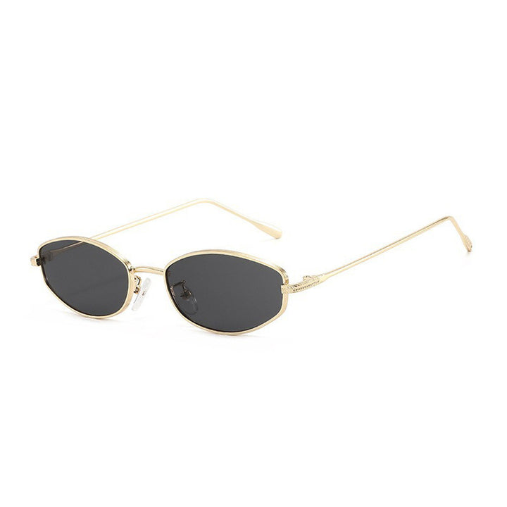 Dame moteriktig solbrille i minimalistisk ovalt design Skanto