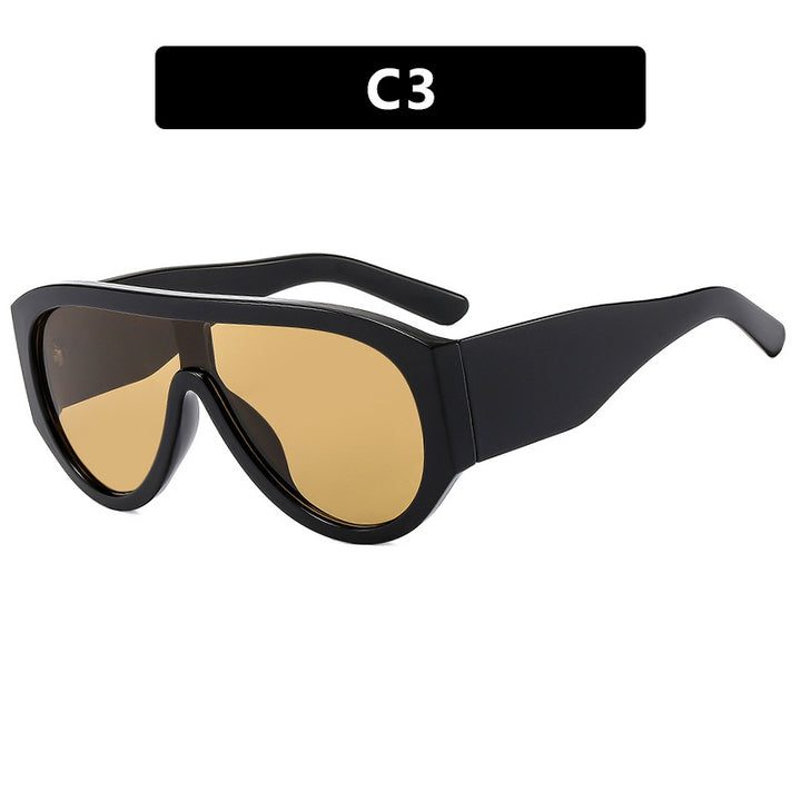 Dame moteriktig solbrille med bred glamourøs ramme og UV-beskyttelse Skanto