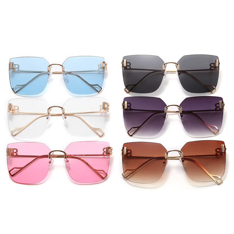 Dame elegant firkantet solbrille med gullfarget metalramme Skanto