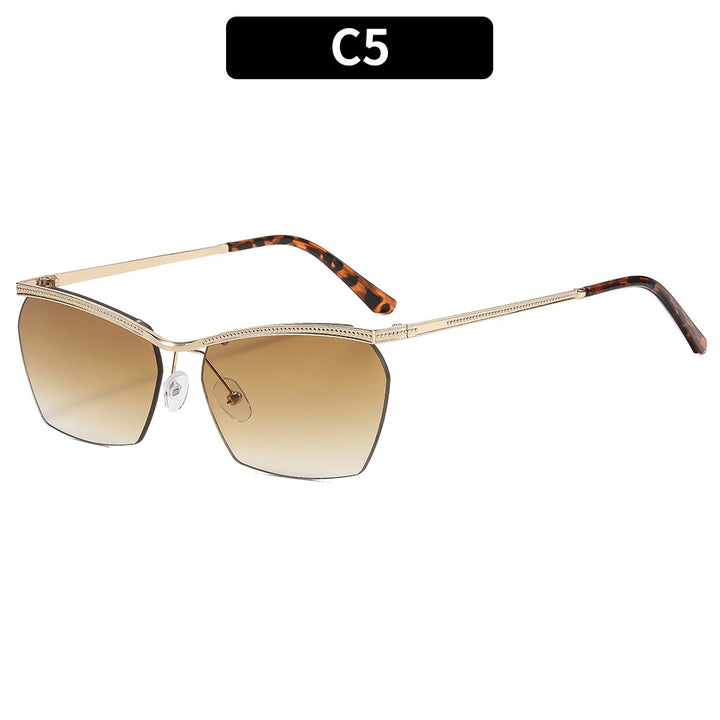 Dame moterik solbrille med filigran ramme og myk fargegradient Skanto