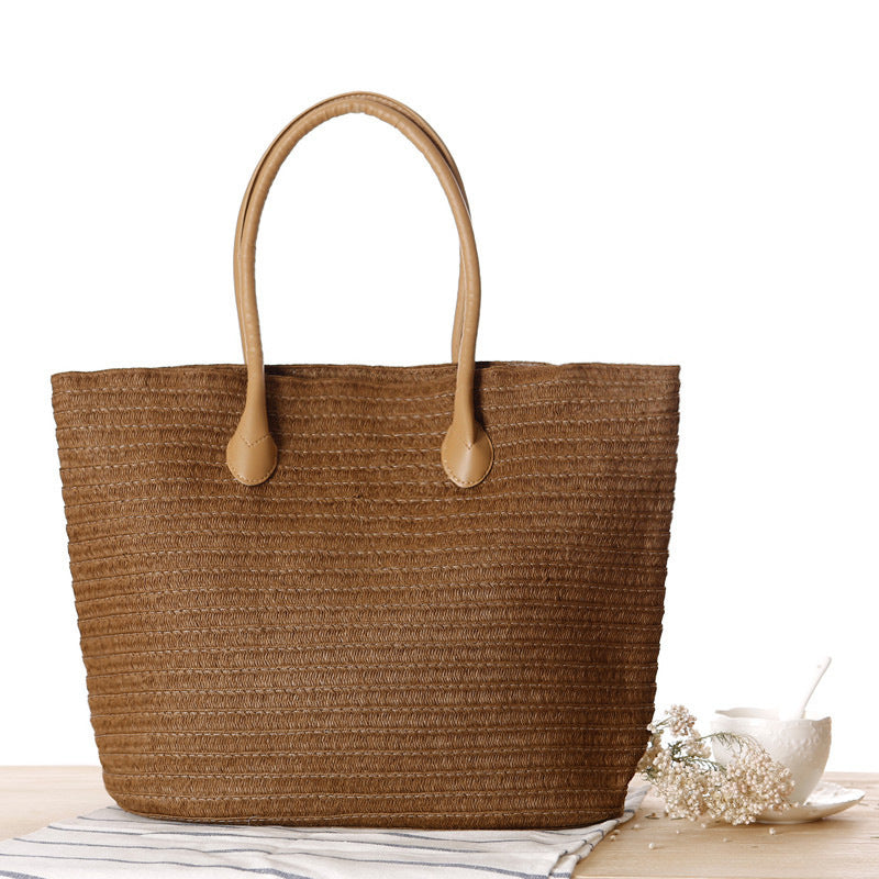 Spacious straw shopper with leather handles Skanto