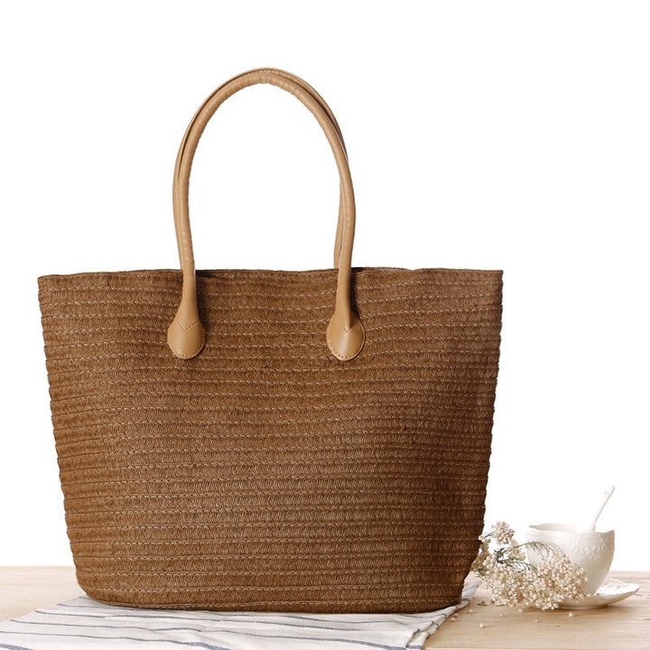 Spacious straw shopper with leather handles Skanto