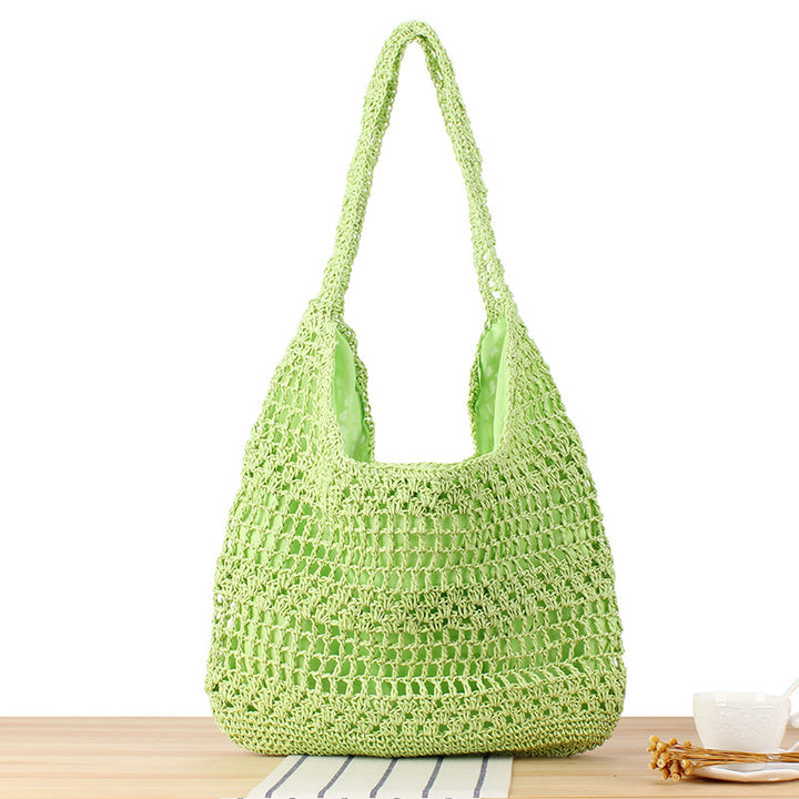 Handbag with floral appliqué in natural material Skanto