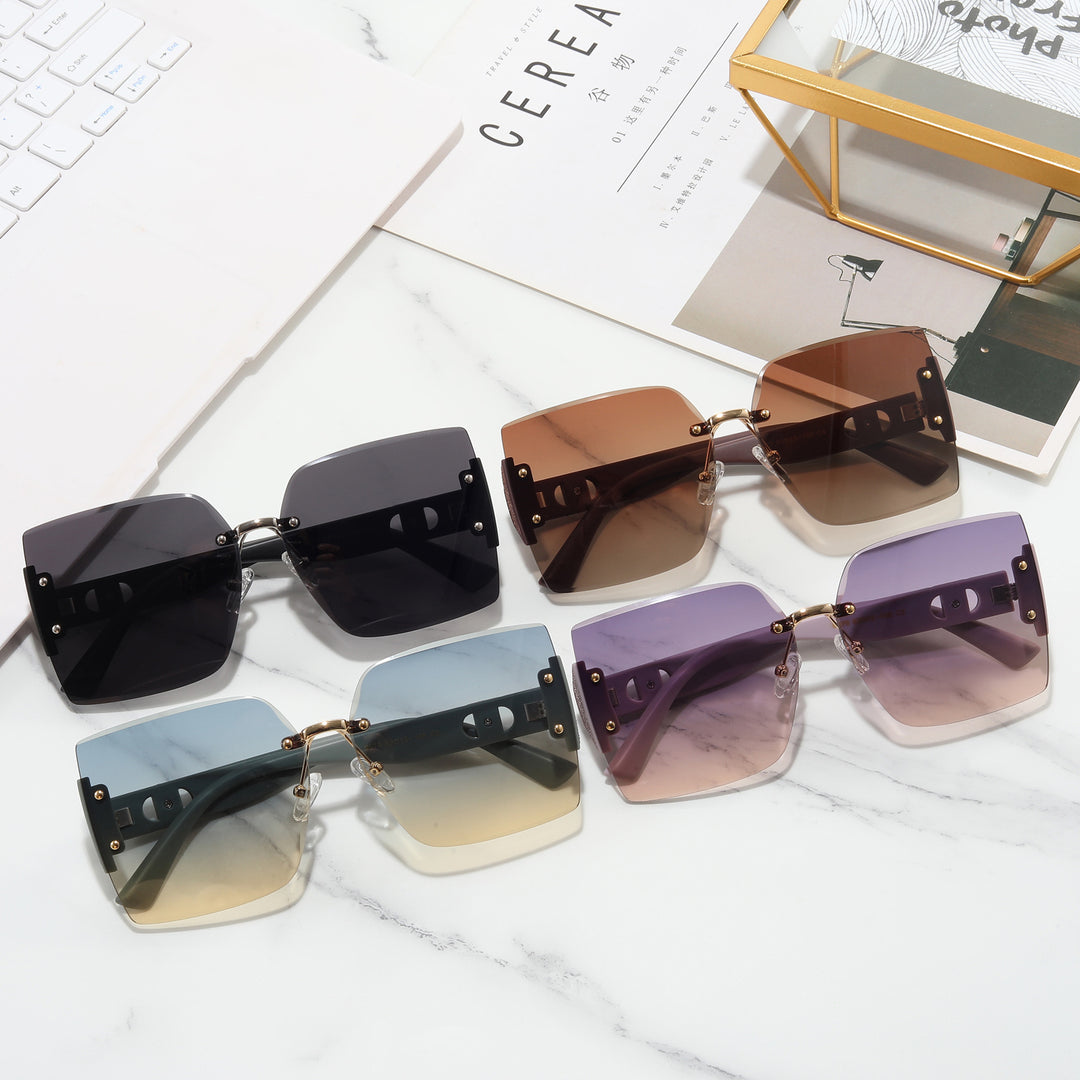 Damer Høyverdig rektangulær solbrille med stilfull metallramme Skanto