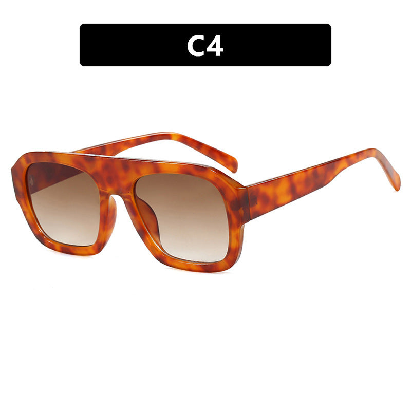 Dame oversized solbrille med markant rektangulært ramme Skanto