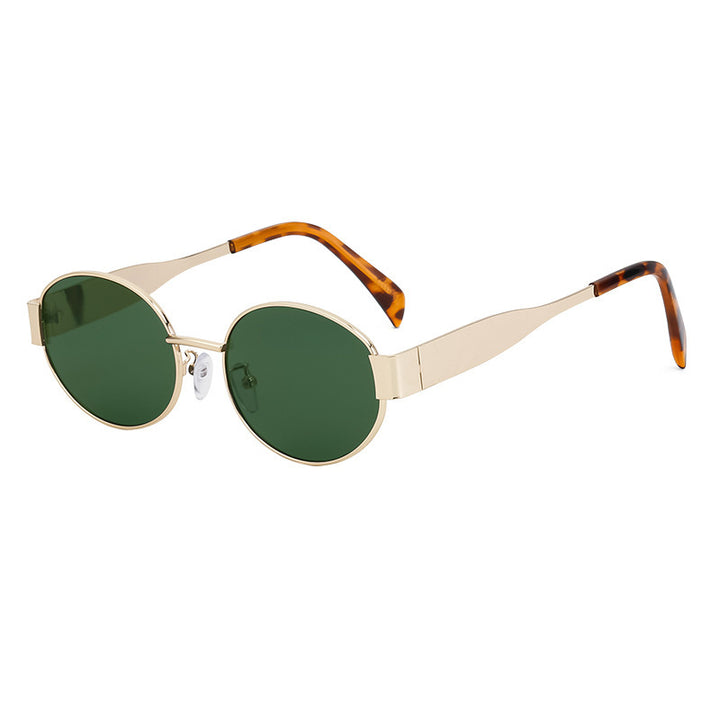 Dame moteriktig solbrille i elegant oval design Skanto