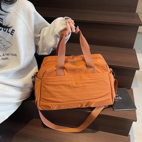 Elegant og romslig sport crossover bag Skanto