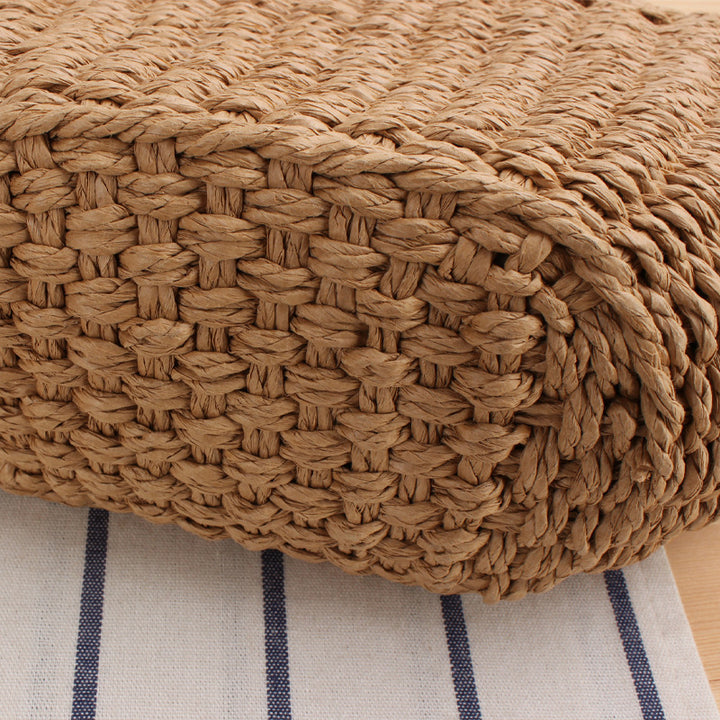 Handbag made of braided natural material with elegant fringe detail Skanto