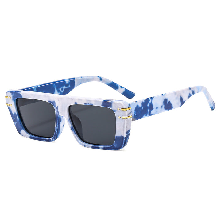 Dame moteriktig kvadratisk solbrille med glitrende akenter Skanto