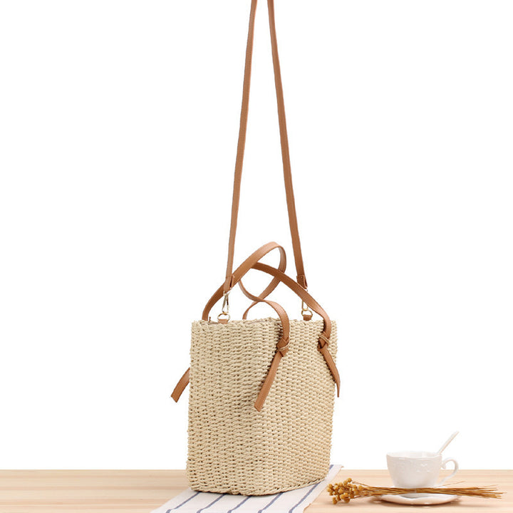 Woven natural material handbag with detachable leather handles Skanto