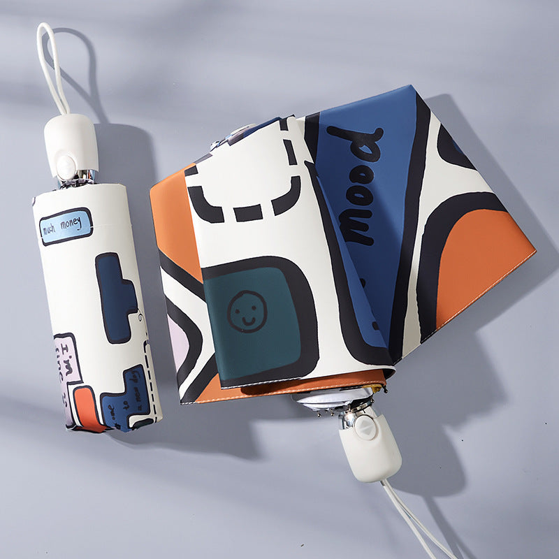 Dame sammenleggbar paraply med unikt grafisk design Skanto