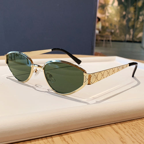 Damer Cat-Eye solbrille med stilfull metallramme og UV-beskyttelse Skanto
