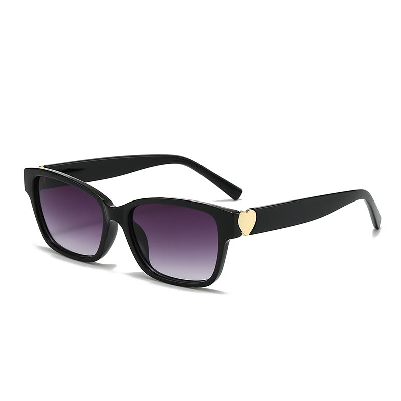 Dame moterik kvadratisk solbrille med hjerte-senter Skanto