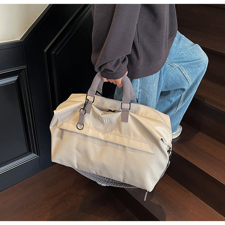 Multifunksjonell bæreveske med robust design og justerbar skulderrem Skanto