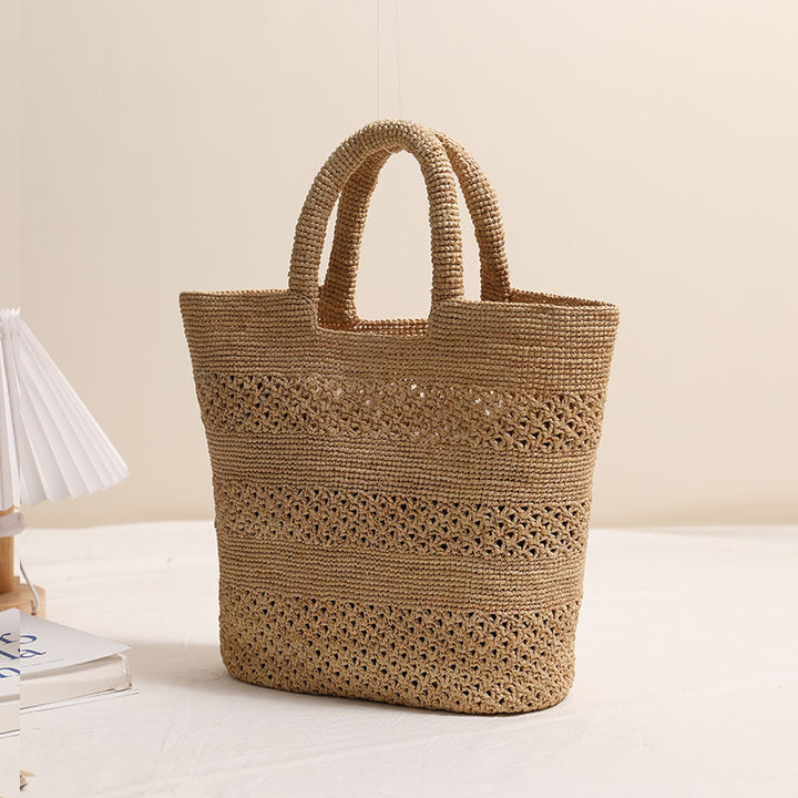 Håndlagd strandveske laget av flettet naturmateriale Skanto