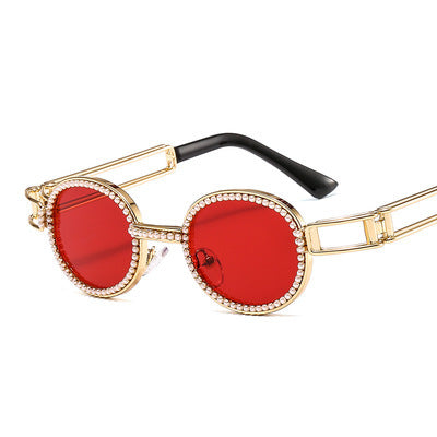 Dame moteriktig solbrille med glamorøs ramme Skanto