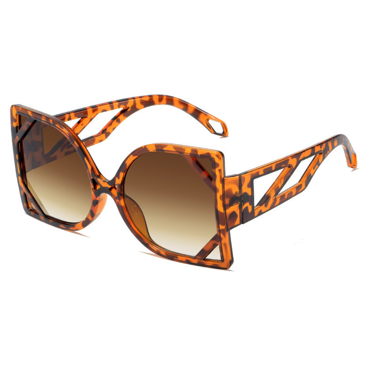 Dame geometrisk solbrille med eksklusiv design og UV-beskyttelse Skanto