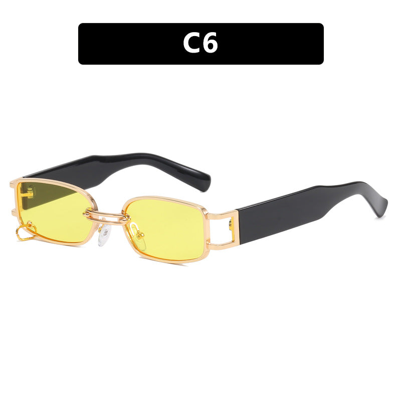 Dame moteriktig solbrille med innovativ rektangulær design og elegante metallakenter Skanto