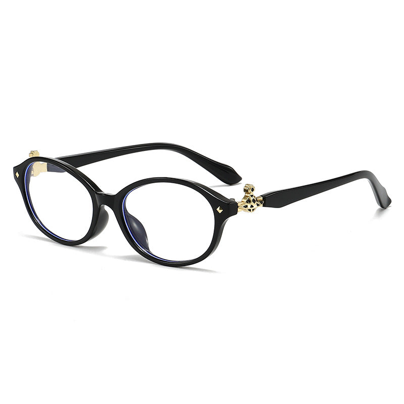Dame motekunstig brille i elegant ova-design med gyldne aksenter Skanto