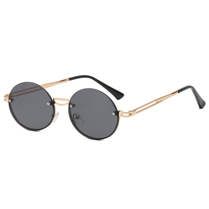 Dame rund solbrille med fin metallramme Skanto