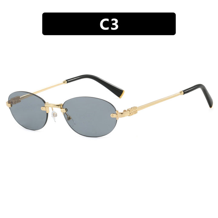 Dame moterimessig solbrille med oval ramme og elegante aksenter Skanto