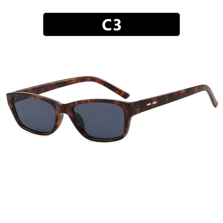 Dame solbrille i moderne, kantete design Skanto