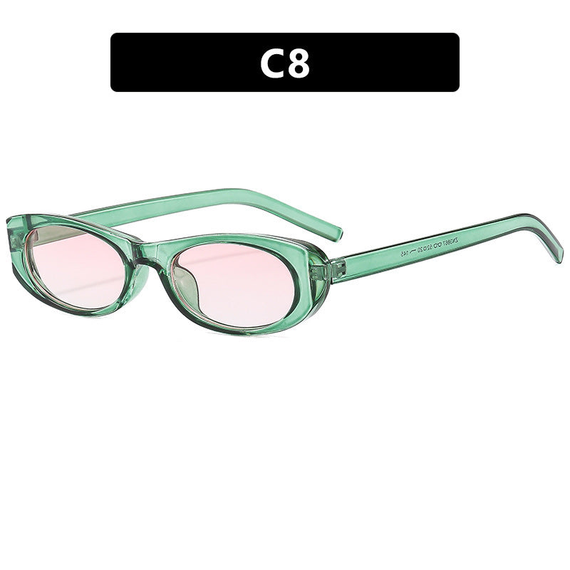 Dame moteriktig solbrille i elegant oval ramme Skanto
