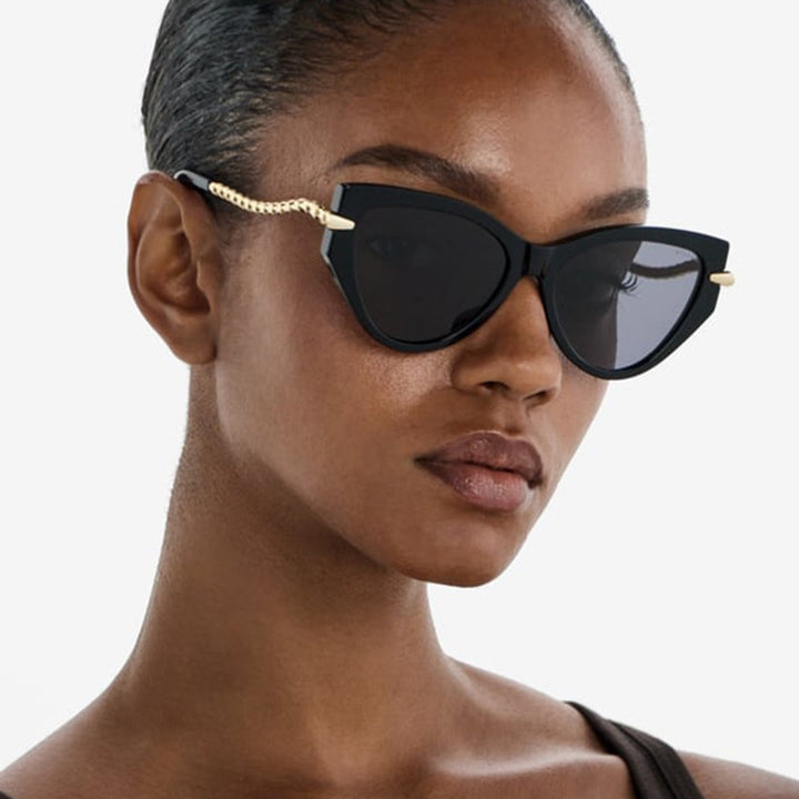Dame Cat-Eye solbriller med elegant metallramme og stilige aksenter Skanto
