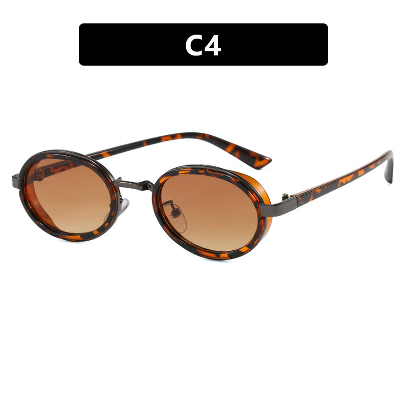 Dame rund solbrille med lette glass og gyldne detaljer Skanto