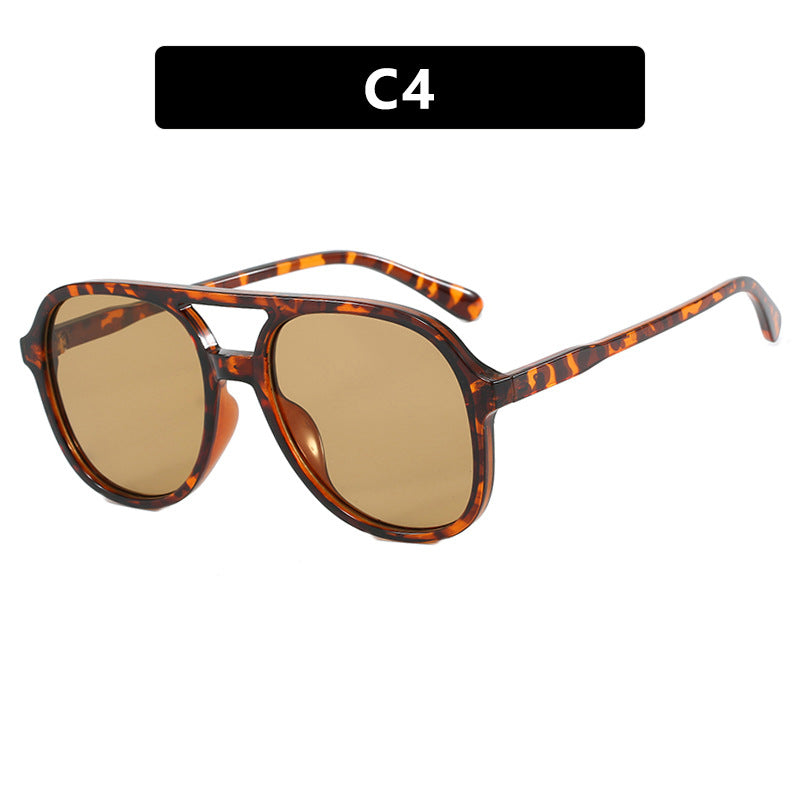 Dame solbrille med elegant skilpaddemønster og UV-beskyttelse Skanto