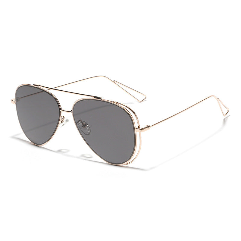 Dame Retro-flyger solbrille med sølvfarget metallramme og speilglass Skanto
