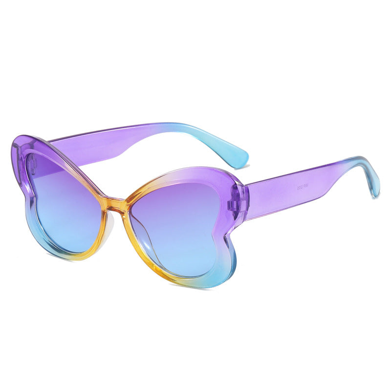 Dame Oversized-solbrille i leken sommerfugl-design Skanto
