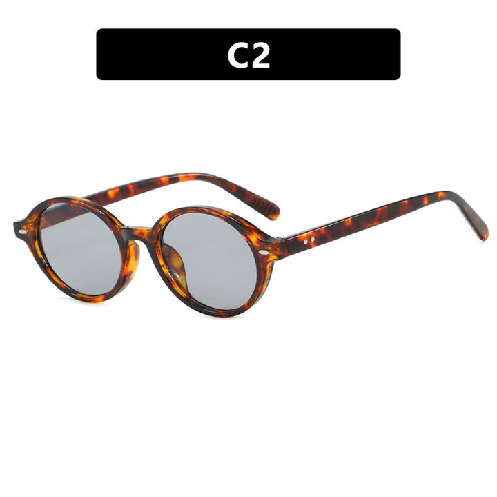 Dame rund solbrille med moderne design og polariserte glass Skanto
