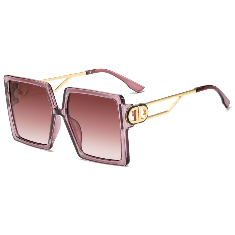 Dame oversized firkantet solbrille med elegant metallramme og polariserte glass Skanto