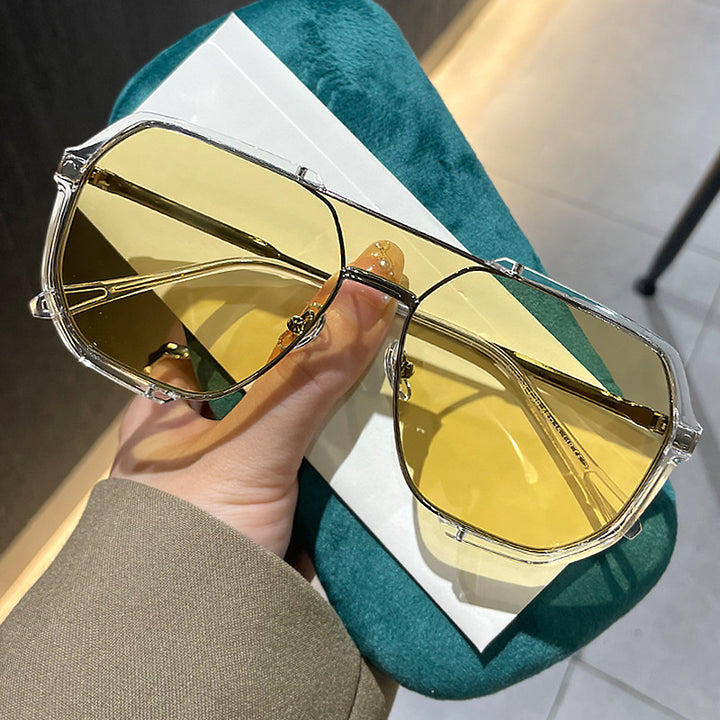 Dame geometrisk solbrille med spesiell ramme og UV-beskyttelse Skanto