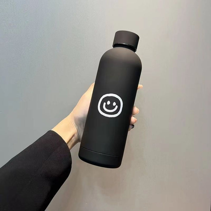 Damen Isoliertrinkflaske med lyst smilmotiv Skanto