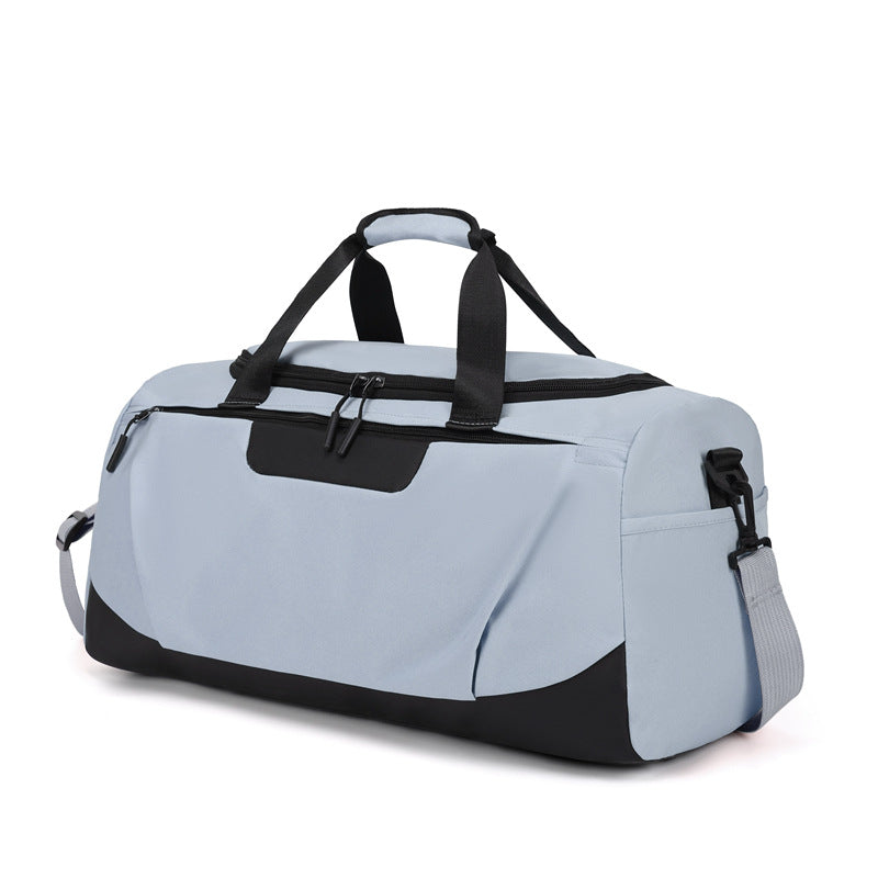 Sporty duffel bag with versatile storage and ergonomic carrying handles Skanto