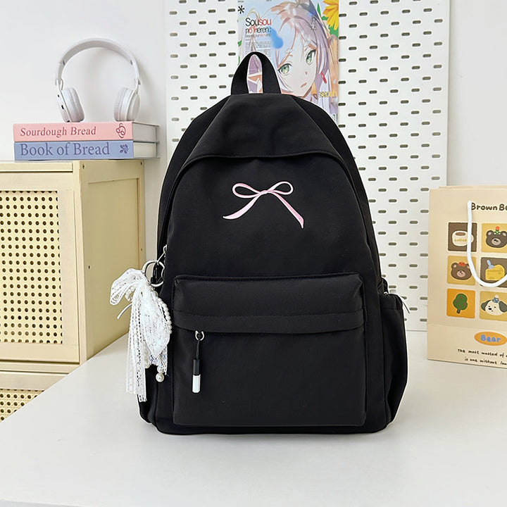 Minimalist bue-smokket skole ryggsekk