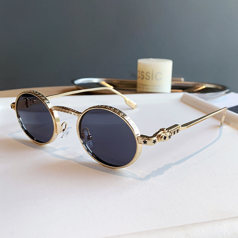 Dame Elegant solbrille med filigran detaljer Skanto