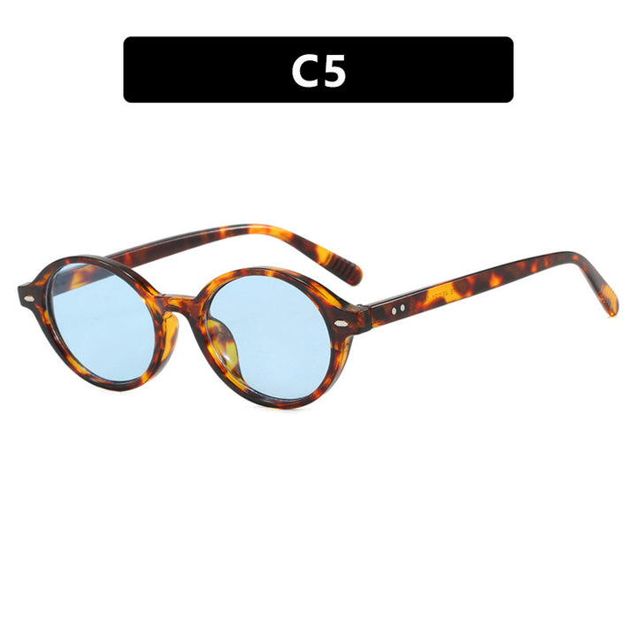 Dame rund solbrille med moderne design og polariserte glass Skanto