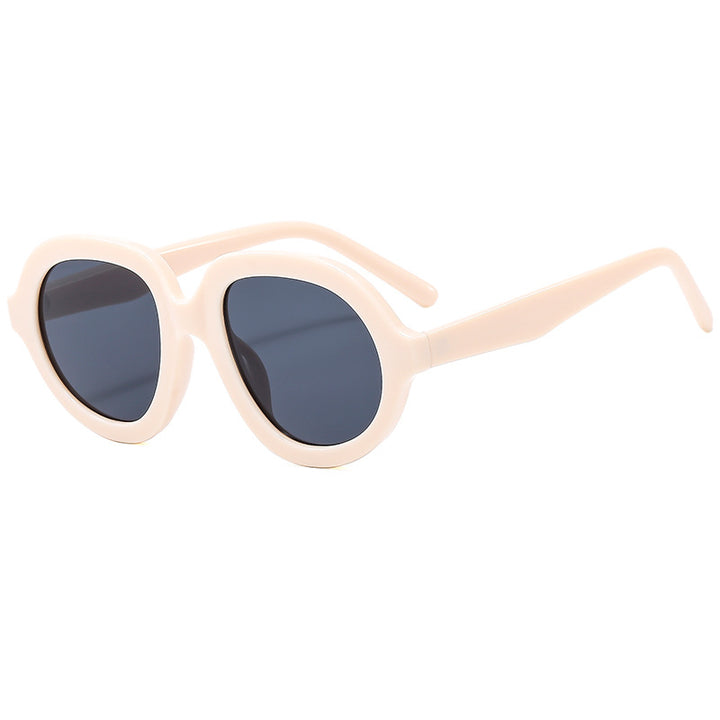 Dame trendy solbriller med bred, oval ramme Skanto