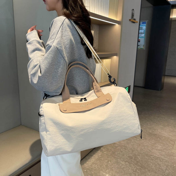 Dame Sporty reiseveske med justerbar skulderrem og elegant design Skanto