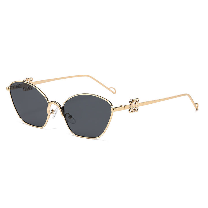 Dame moter Cat-Eye solbriller med filigran metallramme Skanto