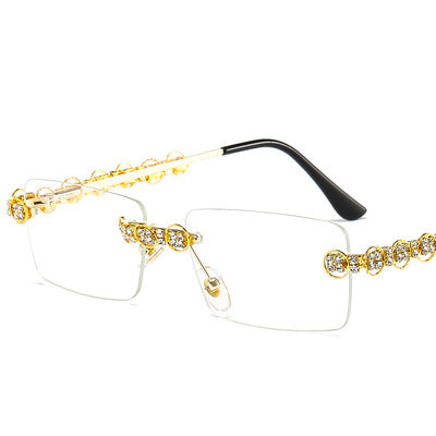 Dame Designer-solbrille med glitrende ramme og rektangulært glass Skanto