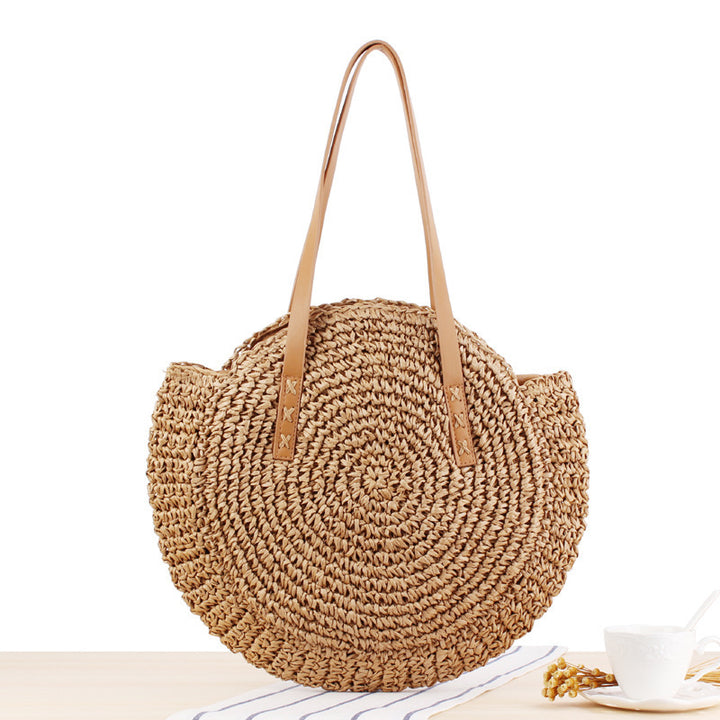 Round straw bag with leather handle Skanto